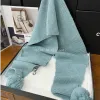 Wholesale of new cross-border export scarves, knitted diamond-shaped long scarves with hairballs hanging at both ends, e-commerce live streaming supply chain supply Application Scenario